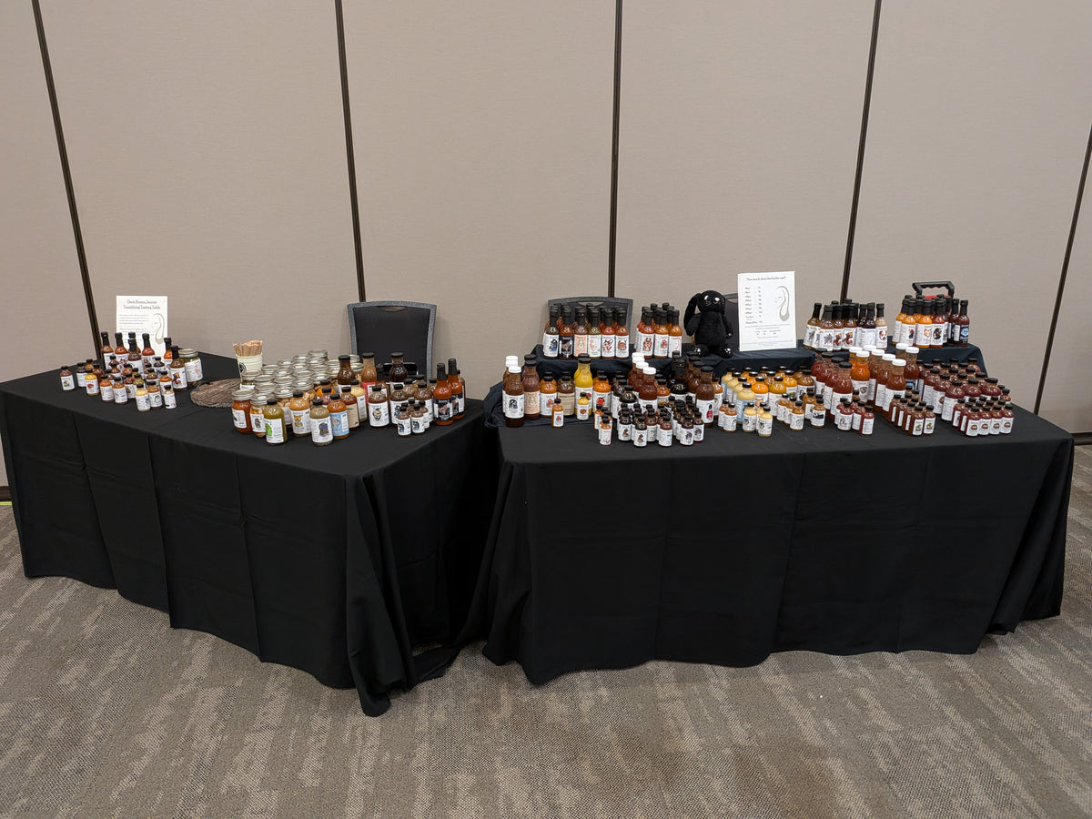 Dark Bunny Sauces' table from CanFURence 2026